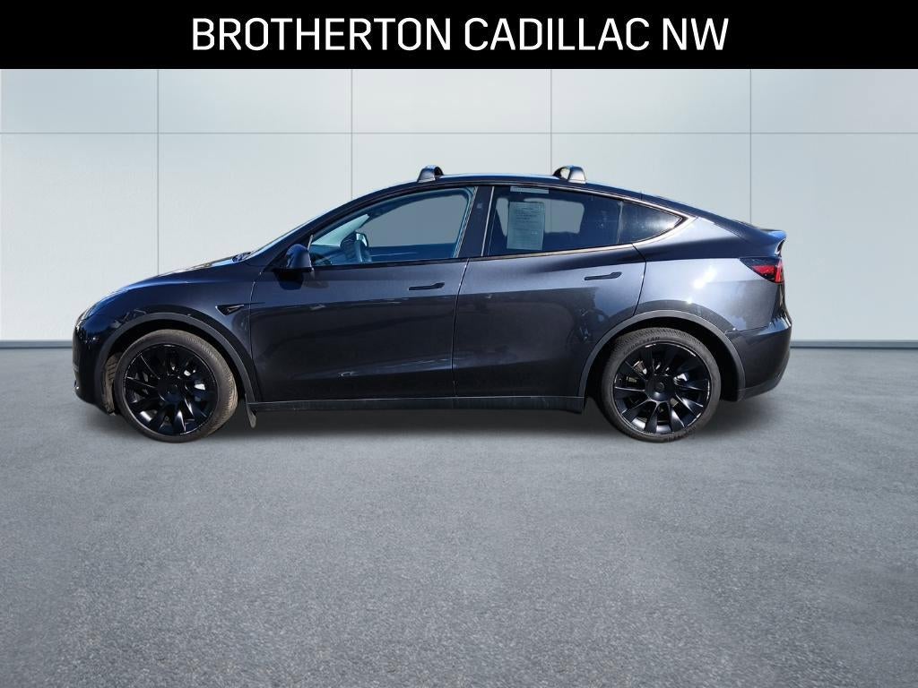Used 2024 Tesla Model Y Long Range with VIN 7SAYGAEE2RF039201 for sale in Shoreline, WA