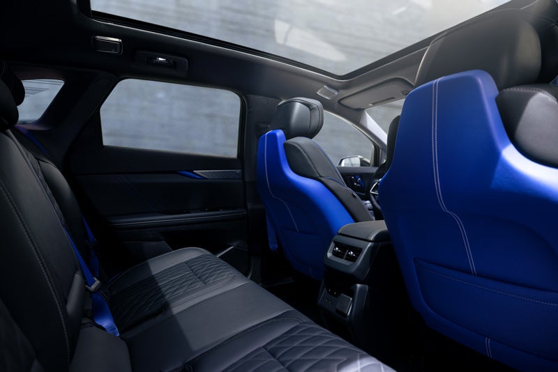 Back Seat View of the 2026 OPTIQ-V Blue Front Seats, Sun Roof, and Interior | Brotherton Cadillac NW in SHORELINE WA